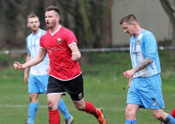 Steve Bromley celebrates the goal against Eccleshill United that ultimately secured Knaresborough Town's promotion from NCEL Division One. Picture: Craig Dinsdale