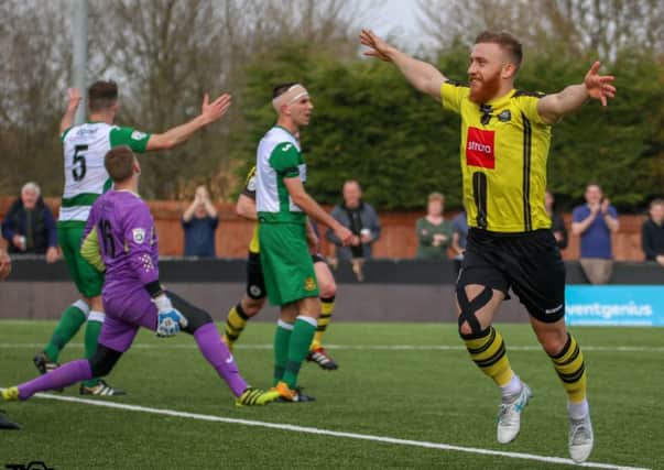 George Thomson celebrates after putting Harrogate Town 2-0 up against Southport. Picture: Town Pix