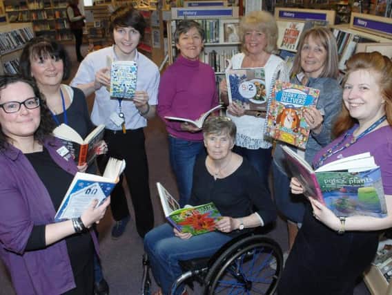 Louise Monkman (library supervisor), Jo Williams (volunteer), Shaun Doyle (library assistant), Kath Chapman (volunteer), Jane Cotter (volunteer), Sandra Gordon (volunteer), Carol Hughes (volunteer), and Claire Thompson (outreach librarian). Picture: Adrian Murray.