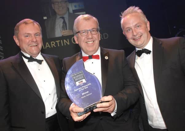 NADV 1804192AM10 2018 Business Awards. Winner of The Business Personality of The Year Martin Gerrard with Sir Gary Verity and Matthew Stamford of sponsors Verity Frearson. (1804192AM10)