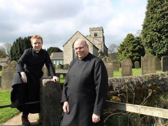 The Rev Abbie Palmer, curate of St Roberts Pannal with the vicar of St Robert's in Pannal, The Rev John Smith