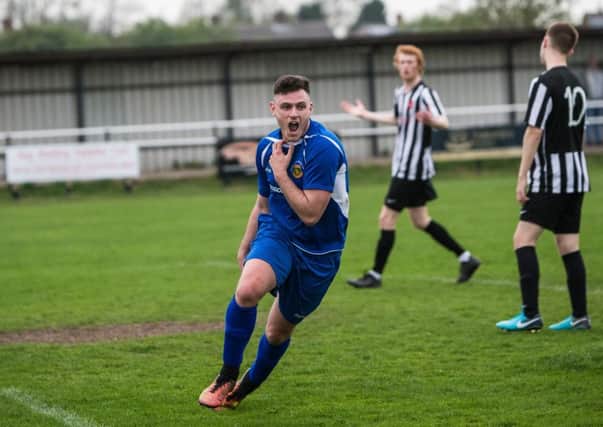 Harrogate Railway striker Josh Underwood celebrates after heading home the winning goal in Saturday's win at Clipstone. Picture: Andy Sumner