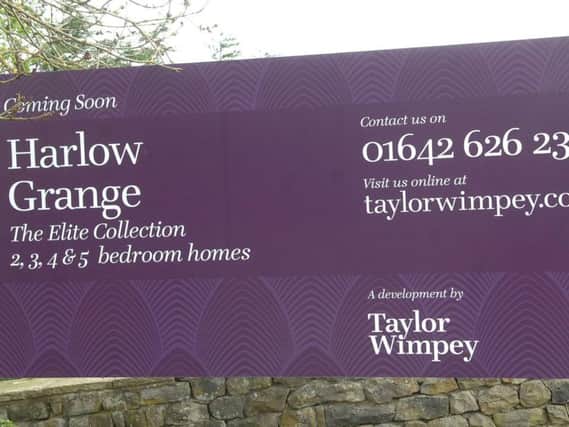 New signage has been erected at the site but Taylor Wimpey confirmed it is incorrect. Picture: Adrian Murray