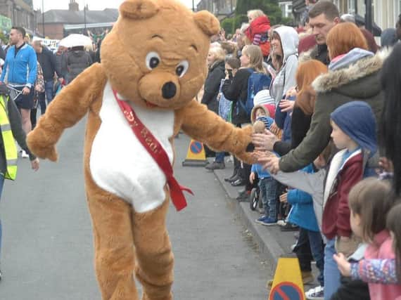 Flashback to last year's successful Bilton Gala - Billowby the Bear meets young members of the crowd.
