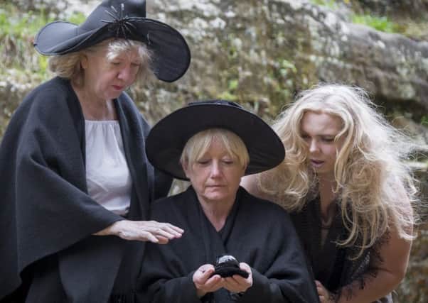 Julie James as Nanny Ogg, Janet Wilson as Granny Weatherwax and Robyn Place as Magrat Garlick