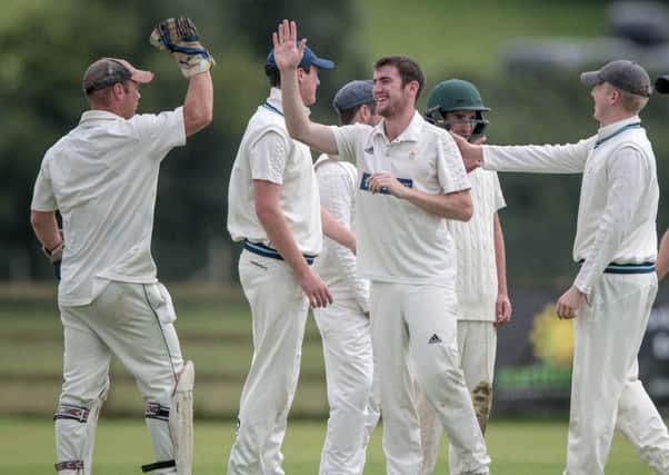 Helperby CC celebrate a wicket. Picture: Caught Light Photography