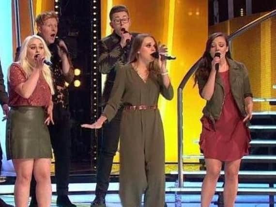 Hit single -Talented young singer Becky Bowe, centre, pictured as part of Leeds Contemporary Singers on BBC TV's Pitch Battle.