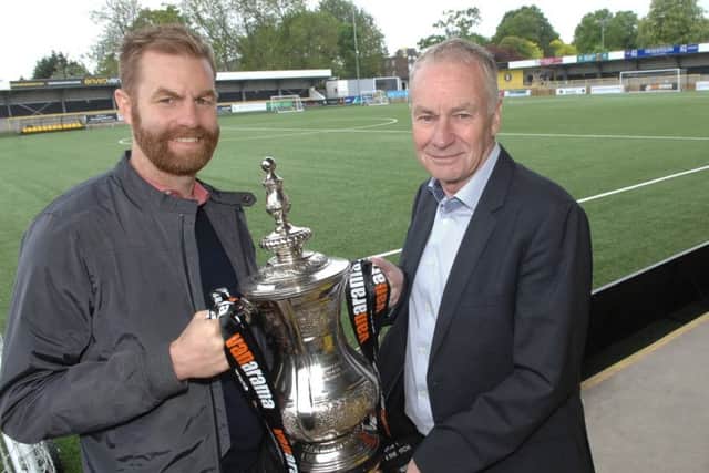 Simon and Irving Weaver with the National League North play-off final winners trophy. Picture: Adrian Murray