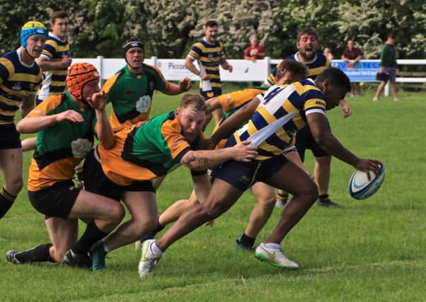 Seru Ravuoco on his way to scoring Knaresborough RUFC's first try during their North Yorkshire Trophy triumph