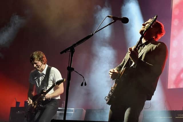 Matthew Followill and Caleb Followill of Kings Of Leon perform during there Album Release concert at Ascend Amphitheater on October 6, 2016 in Nashville, Tennessee